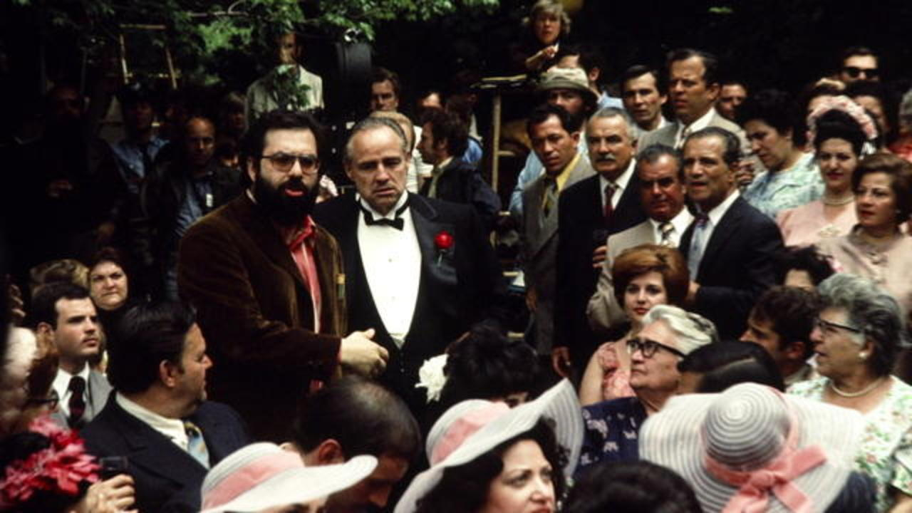 Photo of francis coppola directing the wedding scene in The Godfather