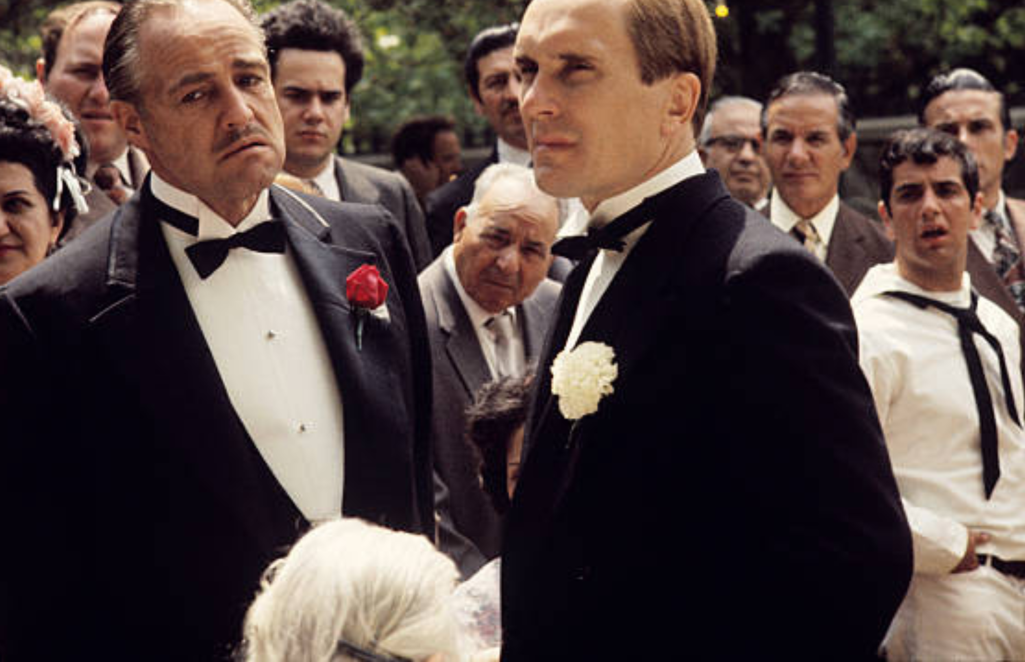 A image with Vito Corleone talking to Tom Hagen